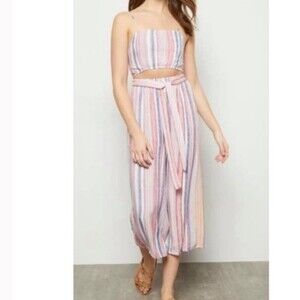 Rue 21 woman’s small striped jumpsuit stomach cut out smocked on back.